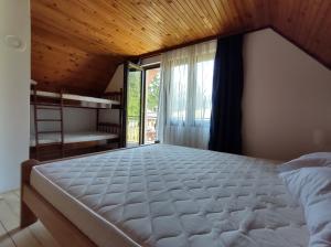 Postel nebo postele na pokoji v ubytování Vikendica Vera