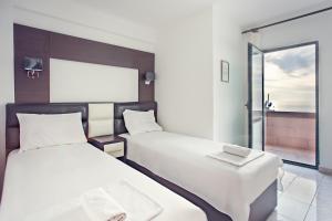 A bed or beds in a room at David apartments and rooms