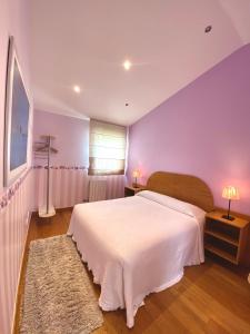 A bed or beds in a room at Apartamento Turistico Plaza Mayor