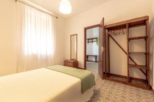 A bed or beds in a room at La Vaquería