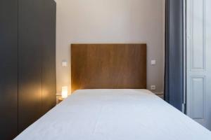 Postelja oz. postelje v sobi nastanitve Oporto Sao Lazaro Apartment