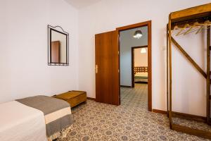 A bed or beds in a room at La Vaquería