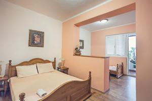 A bed or beds in a room at David apartments and rooms