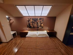 A bed or beds in a room at Nuovo Mondo