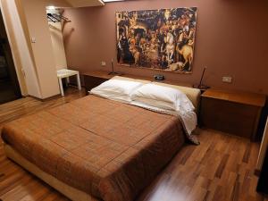 A bed or beds in a room at Nuovo Mondo