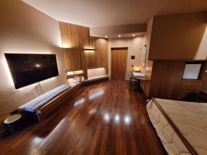 A bed or beds in a room at Nuovo Mondo