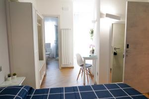 Postel nebo postele na pokoji v ubytování B&B Residenza Aragonese