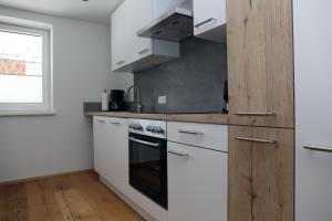 Kuchyň nebo kuchyňský kout v ubytování Appartement Bär
