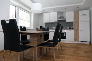 Kuchyň nebo kuchyňský kout v ubytování Appartement Bär