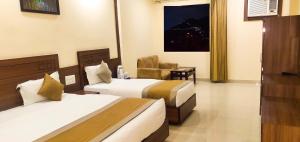 Hotel The Vaishno Devi Hills客房内的一张或多张床位