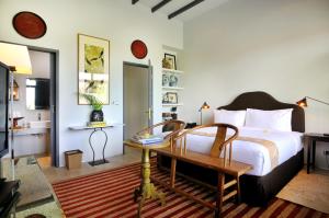 Postel nebo postele na pokoji v ubytování Room & Vespa 1