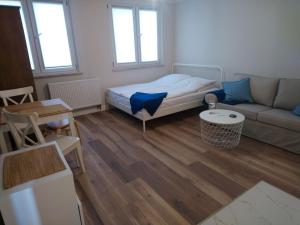 Posteľ alebo postele v izbe v ubytovaní Nowe Apartamenty na Gryfa