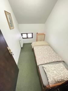 Letto o letti in una camera di Underwoods Žabljak Guesthouse