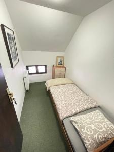 Letto o letti in una camera di Underwoods Žabljak Guesthouse