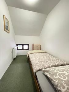 Letto o letti in una camera di Underwoods Žabljak Guesthouse