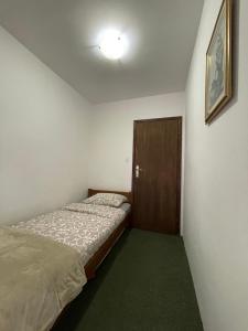 Letto o letti in una camera di Underwoods Žabljak Guesthouse