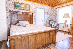 Postel nebo postele na pokoji v ubytování Käbruotsa farmhouse