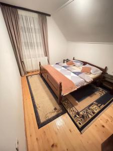 Letto o letti in una camera di Underwoods Žabljak Guesthouse