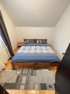 Letto o letti in una camera di Underwoods Žabljak Guesthouse