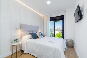 Postel nebo postele na pokoji v ubytování CANELAS LUXURY + 30 fotografií