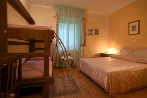 Postel nebo postele na pokoji v ubytování Hotel Relais Valle Orientina + 37 fotografií