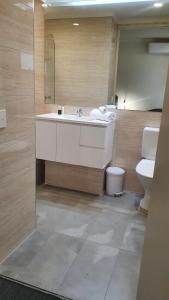 Koupelna v ubytování Hotel Cavalier