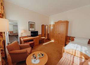 Postel nebo postele na pokoji v ubytování Hotel Jungclaus + 29 fotografií