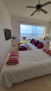 Postel nebo postele na pokoji v ubytování Coral