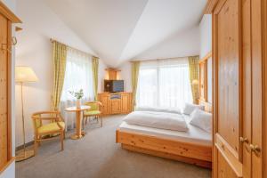 Voodi või voodid majutusasutuse Garni Hotel Am Meilenstein toas