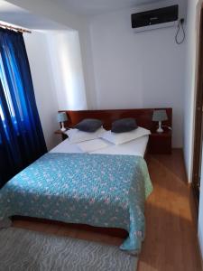 Ein Bett oder Betten in einem Zimmer der Unterkunft Casa Zoe Seaca