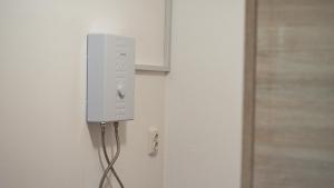 a wii controller is hanging on a wall at Poiana cu flori in Satu Mare +19 photos