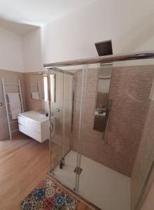 a bathroom with a shower and a sink at Coco' Country House Lecce in Lecce