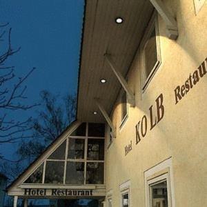 a hospital building with a sign on the side of it at Hotel Kolb in Zeil