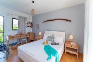 Postel nebo postele na pokoji v ubytování Eco Beach And Magic Garden Hotel + 37 fotografií