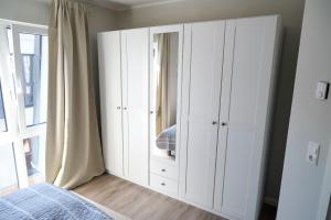 Postel nebo postele na pokoji v ubytování Ferienwohnung Strandhoch