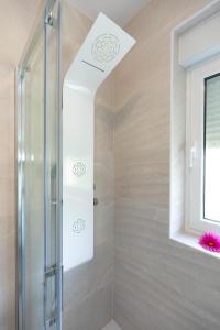 Kúpeľňa v ubytovaní Apartments Andrea V + 23 fotografií
