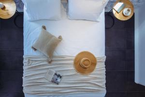 A bed or beds in a room at Amodara Boutique Villas-Naxos Boutique Luxury Private Villas