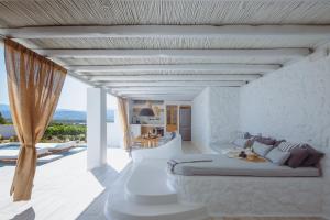 Svetainės erdvė apgyvendinimo įstaigoje Amodara Boutique Villas-Naxos Boutique Luxury Private Villas