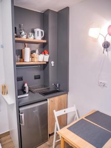 Kuchyň nebo kuchyňský kout v ubytování Pinna Apartments Hvar
