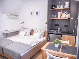 Postel nebo postele na pokoji v ubytování Pinna Apartments Hvar