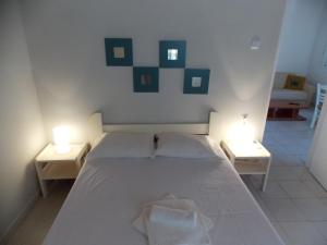 Ένα ή περισσότερα κρεβάτια σε δωμάτιο στο Peter's Village