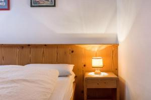 A bed or beds in a room at Casa Lorenz 2