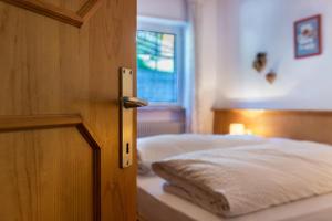 A bed or beds in a room at Casa Lorenz 2