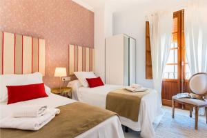 Cama o camas de una habitación en Genteel Home Zaragoza