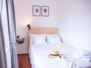 Postel nebo postele na pokoji v ubytování Pinna Apartments Hvar
