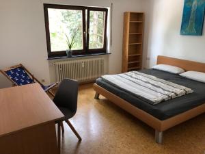 Ένα ή περισσότερα κρεβάτια σε δωμάτιο στο Haus Schwarzwaldblick