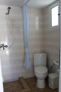 Kúpeľňa v ubytovaní Fengeros Village