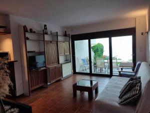 Μια τηλεόραση ή/και κέντρο ψυχαγωγίας στο Beach House Emme