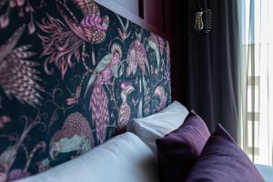 Postel nebo postele na pokoji v ubytování The Baltic Hotel