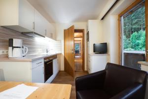 A kitchen or kitchenette at Appartements Hochlega